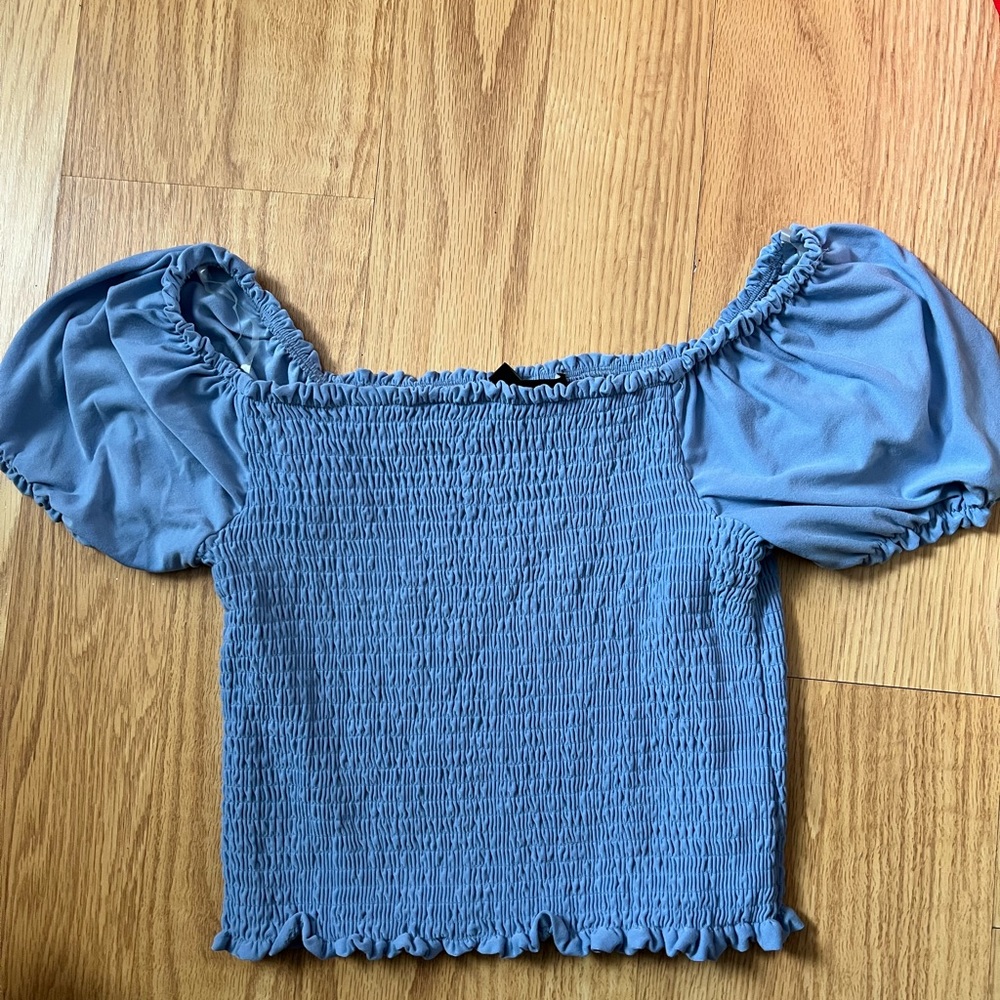 Light blue top